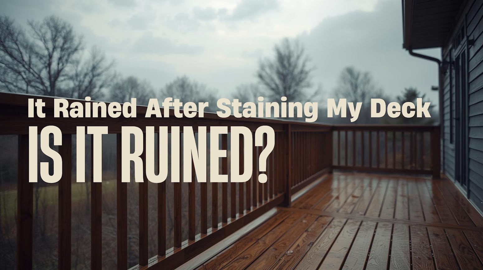Freshly stained deck with light rain droplets on the surface, illustrating how Kansas City weather can affect stain drying.