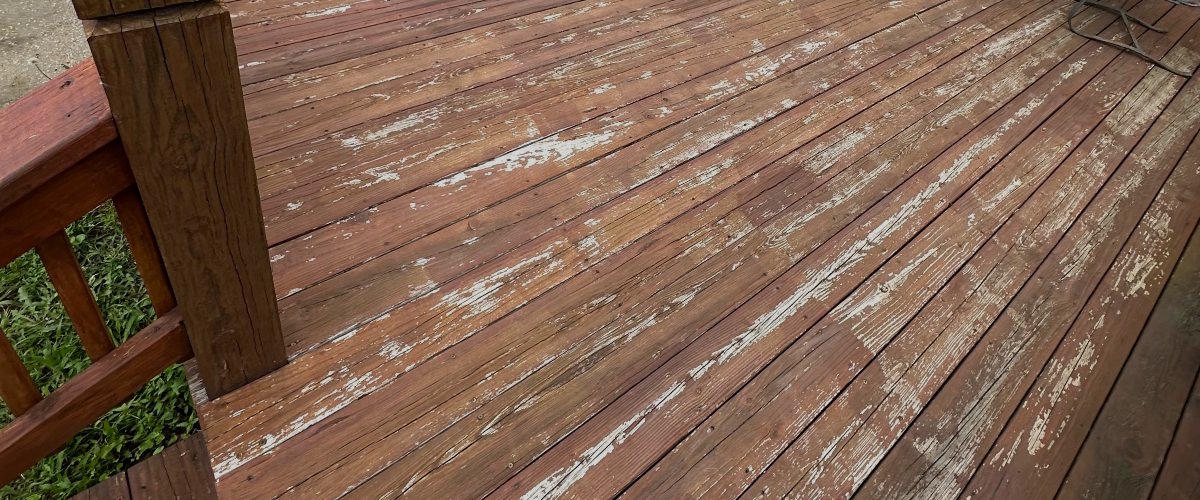 Peeling deck stain on a wood deck in Kansas City